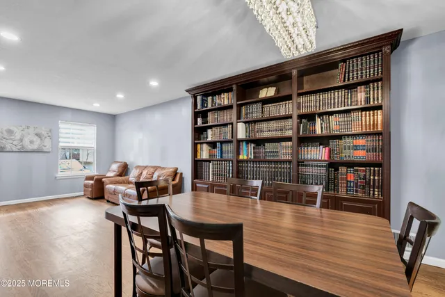 a workspace with furniture window and wooden floor