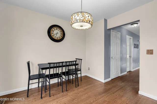 a view of a hallway with seating area