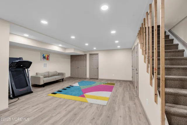 a room with furniture and wooden floor