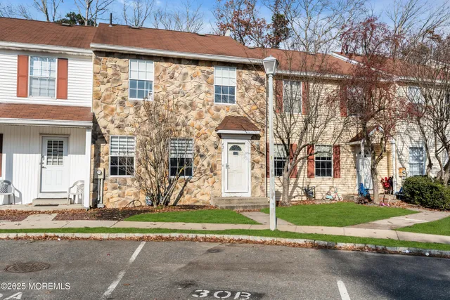 front view of house with a yard