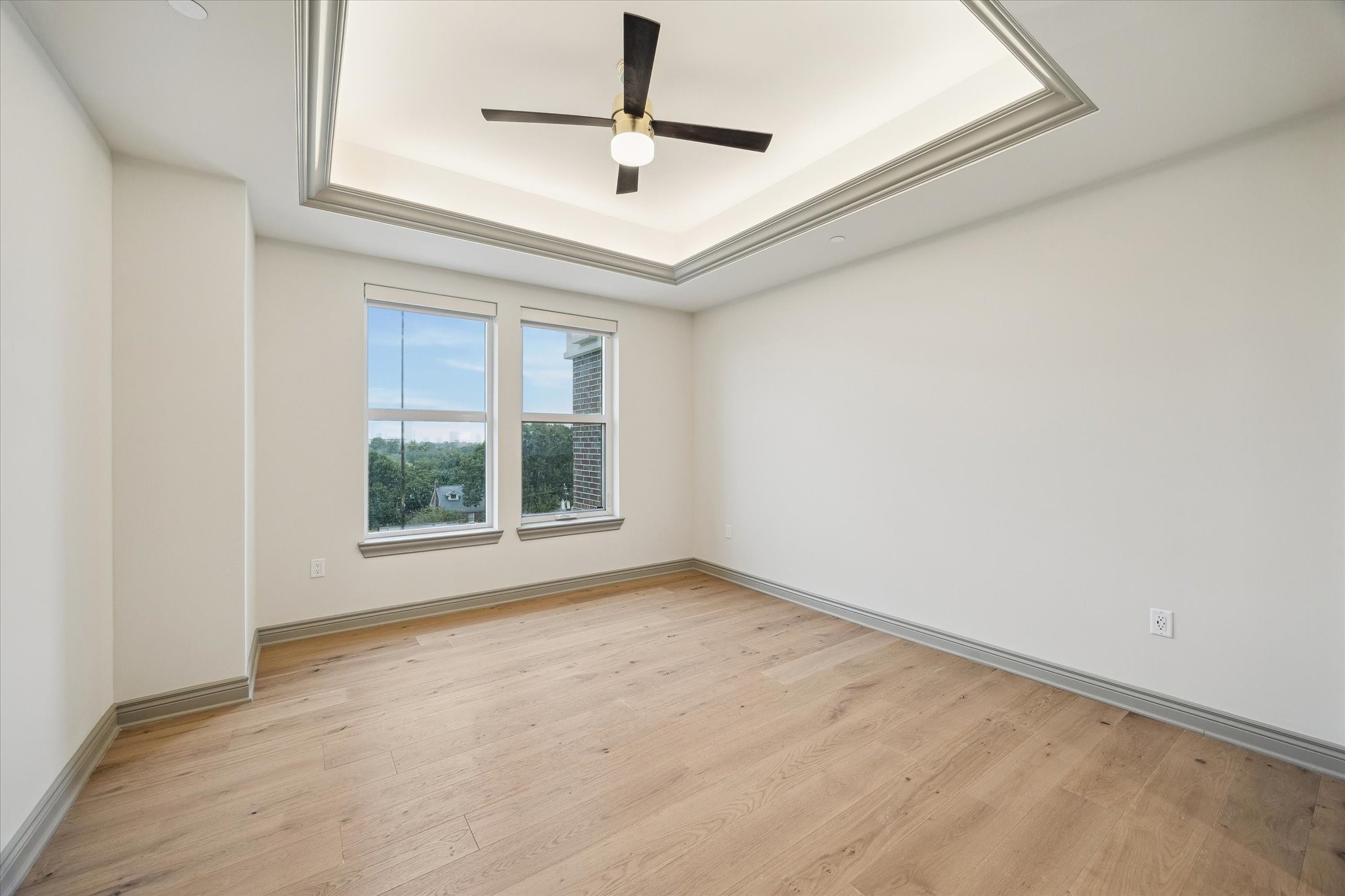 1717 Bissonnet Street, Unit 1101 Houston, TX 77005 - Photo 20 of 34 a view of an empty room with a window