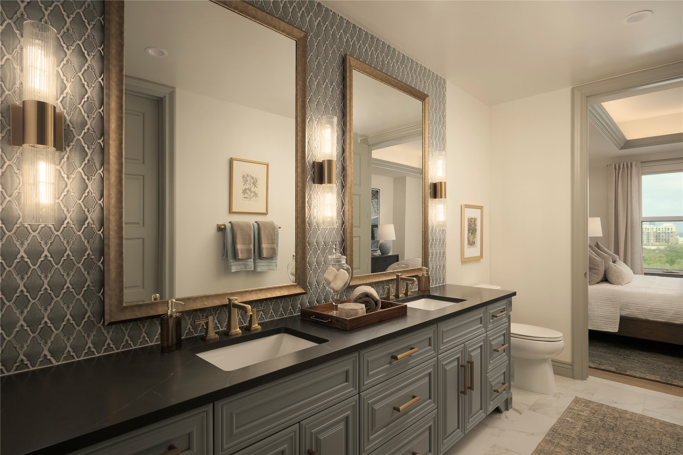 1717 Bissonnet Street, Unit 1101 Houston, TX 77005 - Photo 24 of 35 a bathroom with a double vanity sink and a mirror