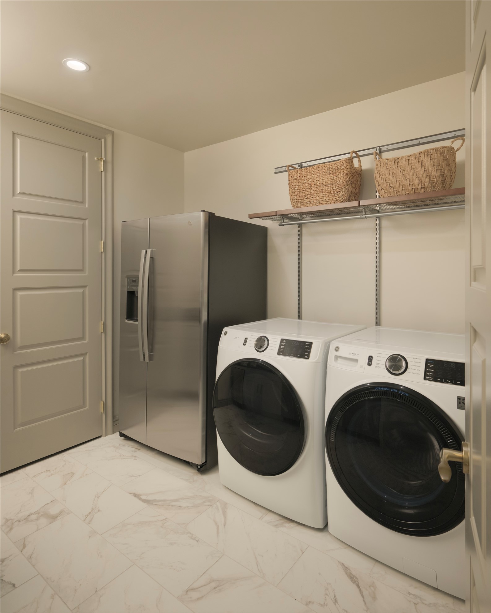 1717 Bissonnet Street, Unit 1101 Houston, TX 77005 - Photo 26 of 35 Service kitchen with second refrigerator, full size washer and dryer.