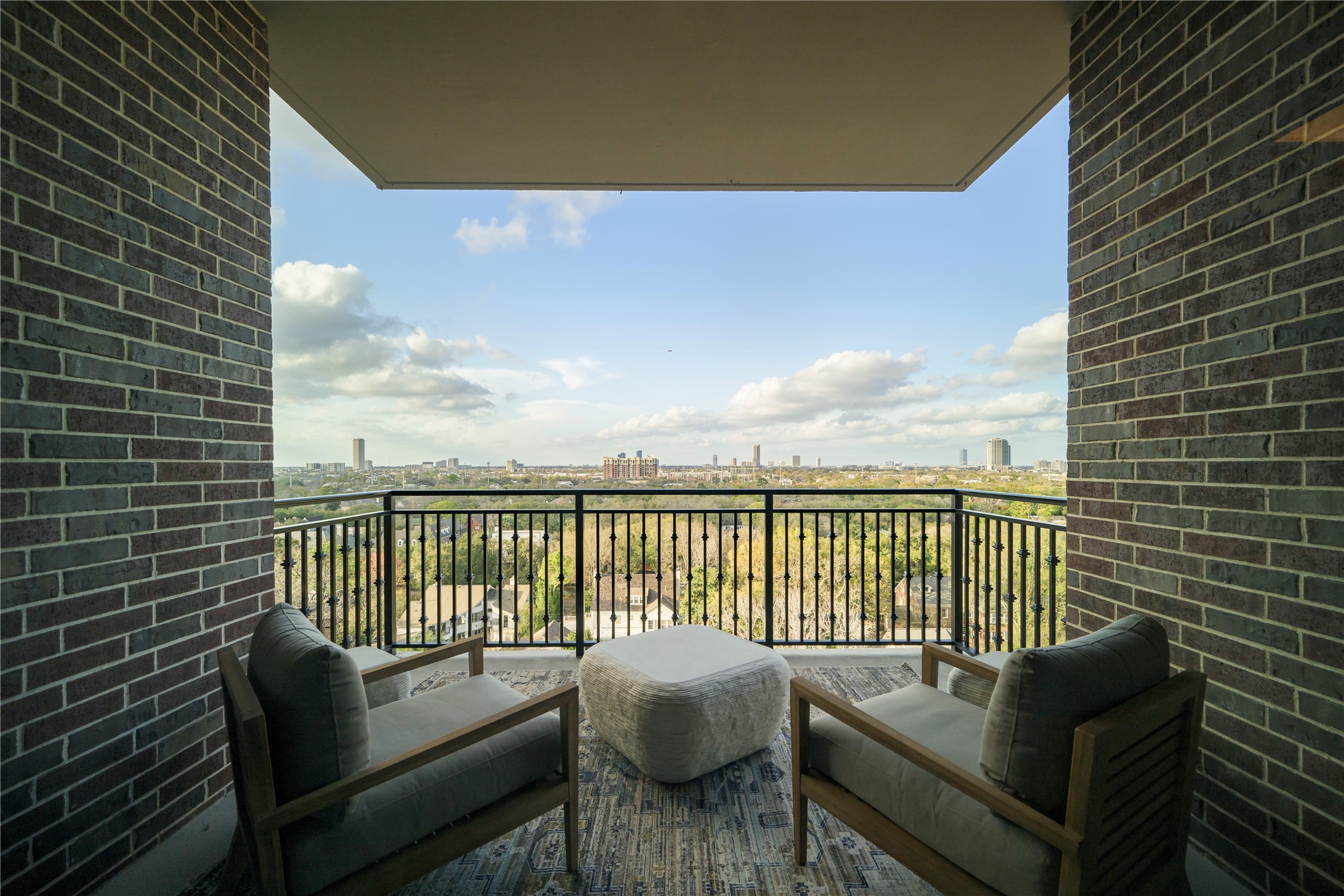 1717 Bissonnet Street, Unit 1101 Houston, TX 77005 - Photo 28 of 35 a balcony with chairs