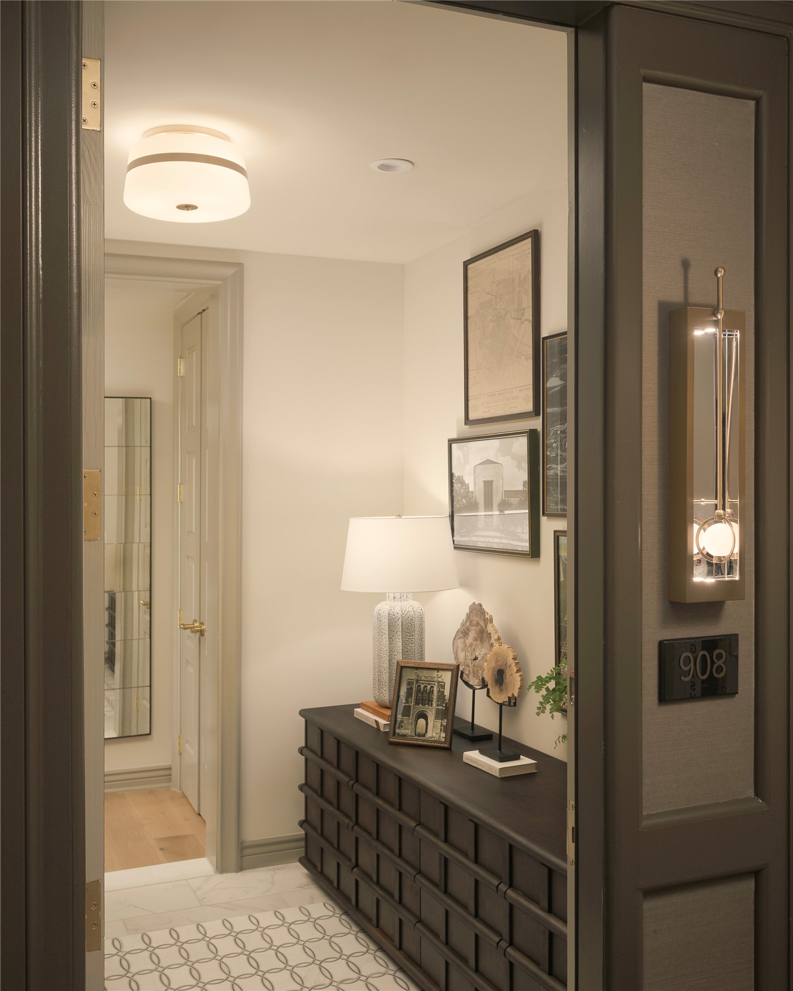 1717 Bissonnet Street, Unit 1101 Houston, TX 77005 - Photo 8 of 35 Inviting entry with coat closet and powder room.