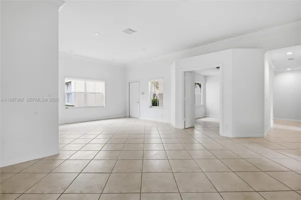 a view of an empty room and window