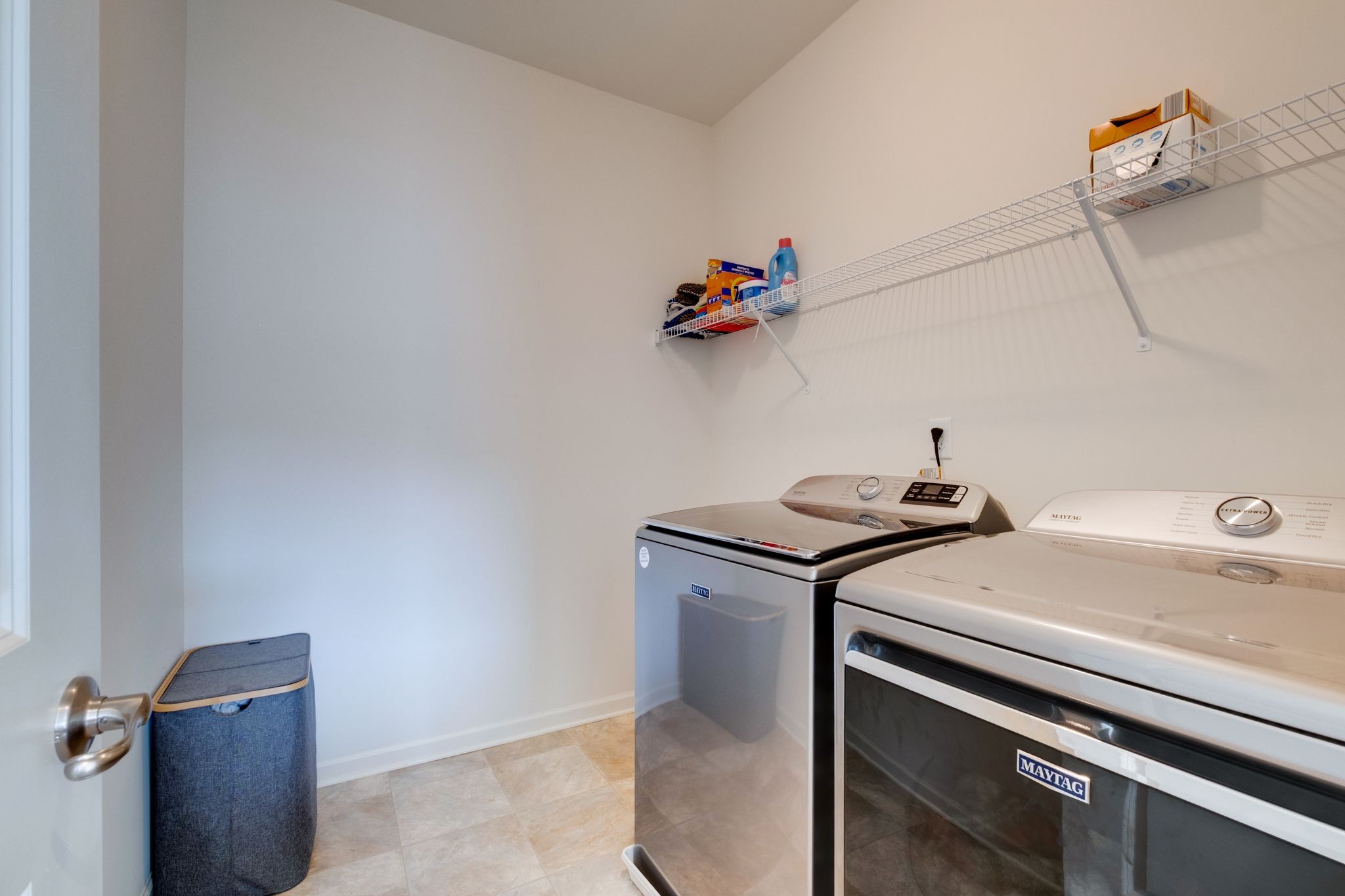 3611 Hoggett Ford Road Hermitage, TN 37076 - Photo 21 of 34 a view of a storage and utility room with washer and dryer