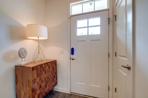 a view of entryway with wooden floor