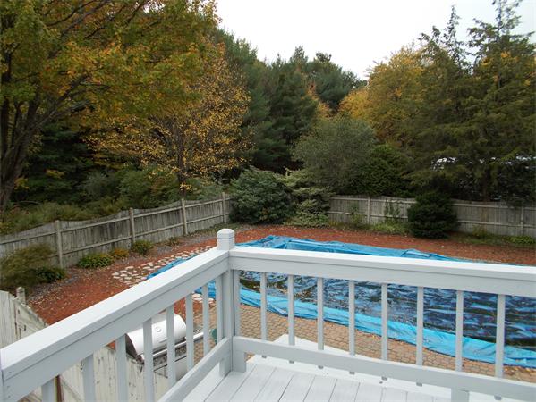 13 Winsor Road Billerica, MA 01821 - Photo 7 of 23 a view of a lake with a large trees