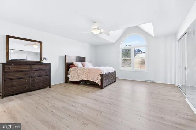 a view of a balcony with wooden floor