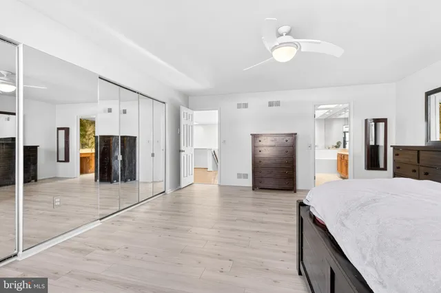 a view of a balcony with wooden floor