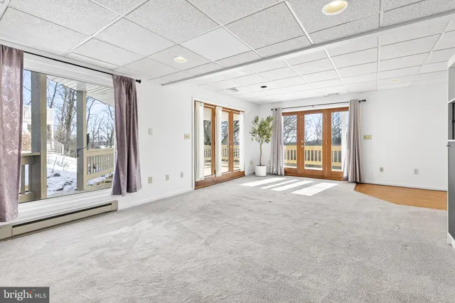 a picture of a bathroom with a shower