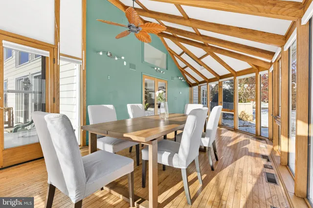 a kitchen with granite countertop a refrigerator and a sink