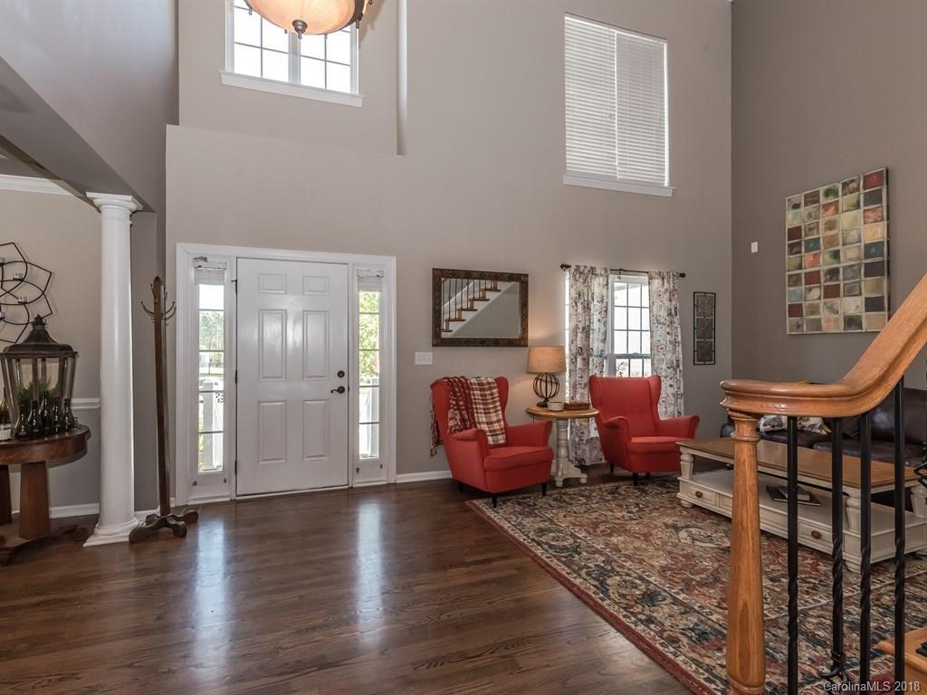 2002 Spanish Moss Road Indian Trail, NC 28079 - Photo 3 of 28 a living room with furniture window and wooden floor