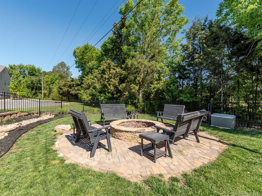 2002 Spanish Moss Road Indian Trail, NC 28079 - Photo 22 of 28 a view of a patio with a table and chairs