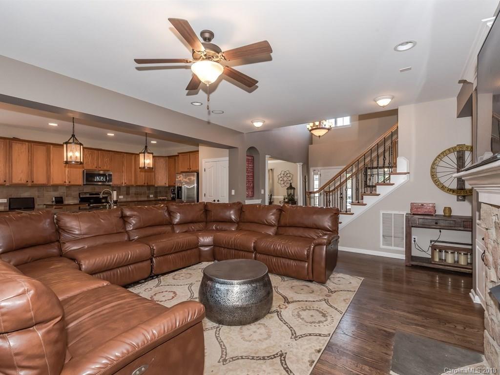 2002 Spanish Moss Road Indian Trail, NC 28079 - Photo 8 of 28 a living room with furniture and a wooden floor