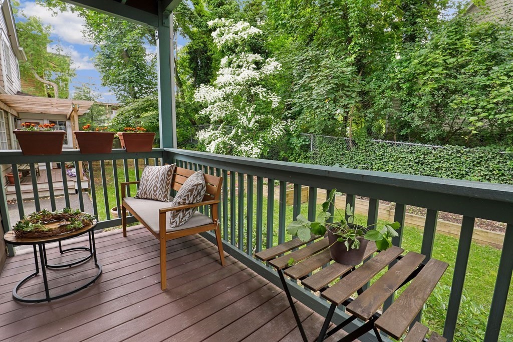 71-73 Brookley Road, Unit 1 Boston, MA 02130 - Photo 22 of 28 a view of a two chairs in the deck