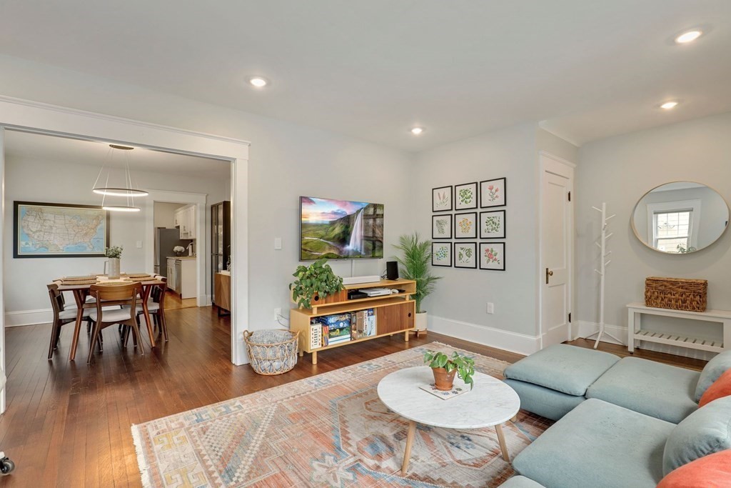 71-73 Brookley Road, Unit 1 Boston, MA 02130 - Photo 5 of 28 a living room with furniture and a wooden floor