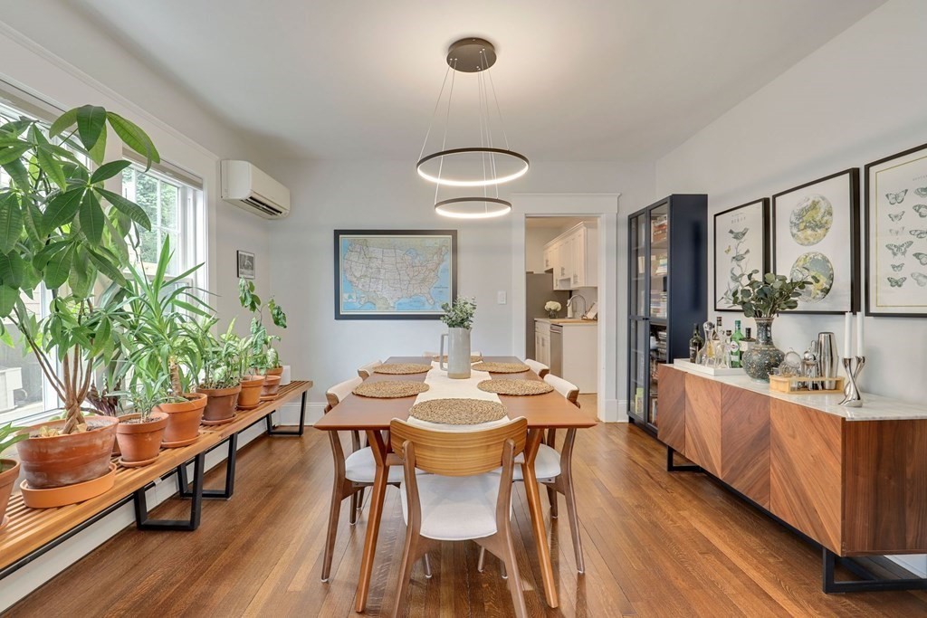 71-73 Brookley Road, Unit 1 Boston, MA 02130 - Photo 6 of 28 a view of a dining room with furniture window and wooden floor