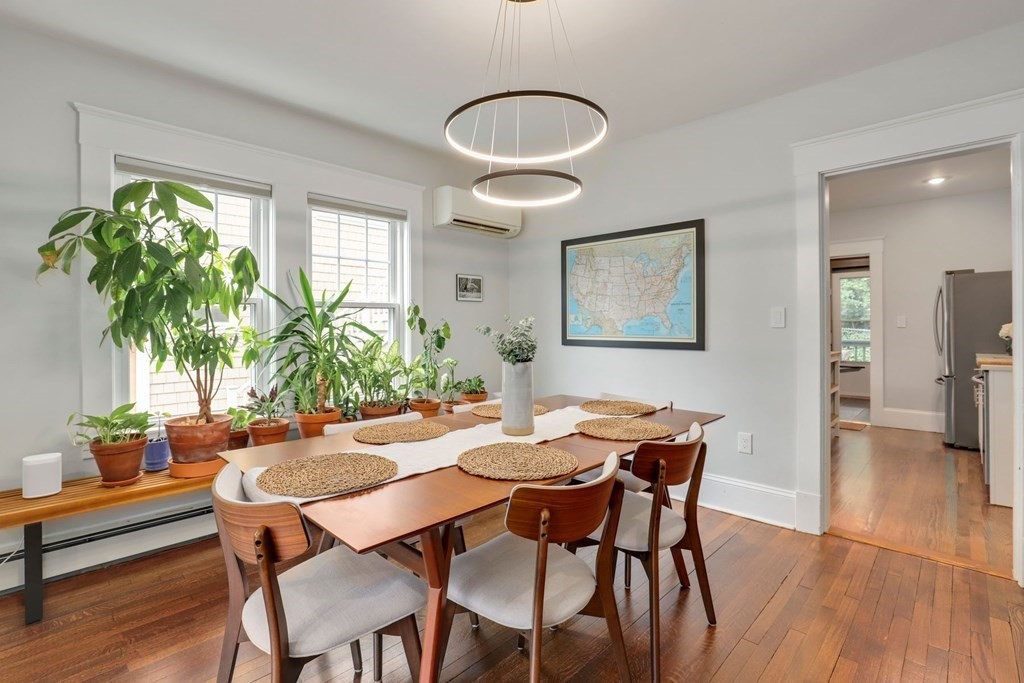 71-73 Brookley Road, Unit 1 Boston, MA 02130 - Photo 7 of 28 a dining room with furniture and window