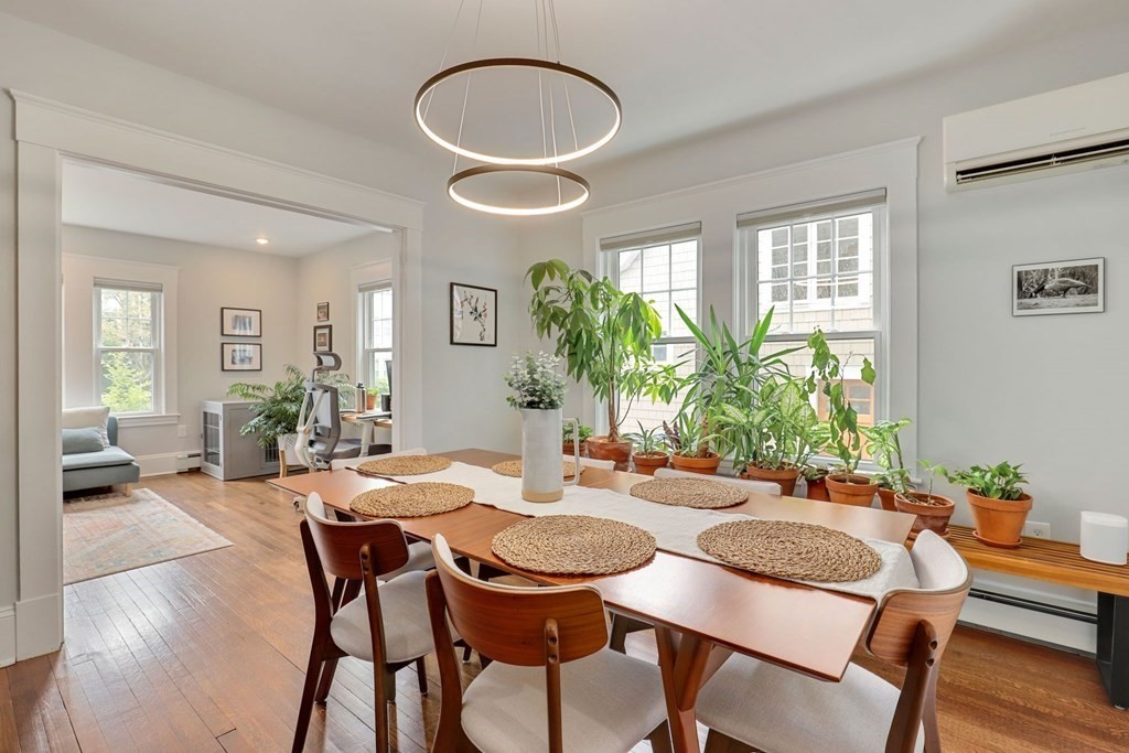 71-73 Brookley Road, Unit 1 Boston, MA 02130 - Photo 10 of 28 a view of a dining room with furniture and wooden floor