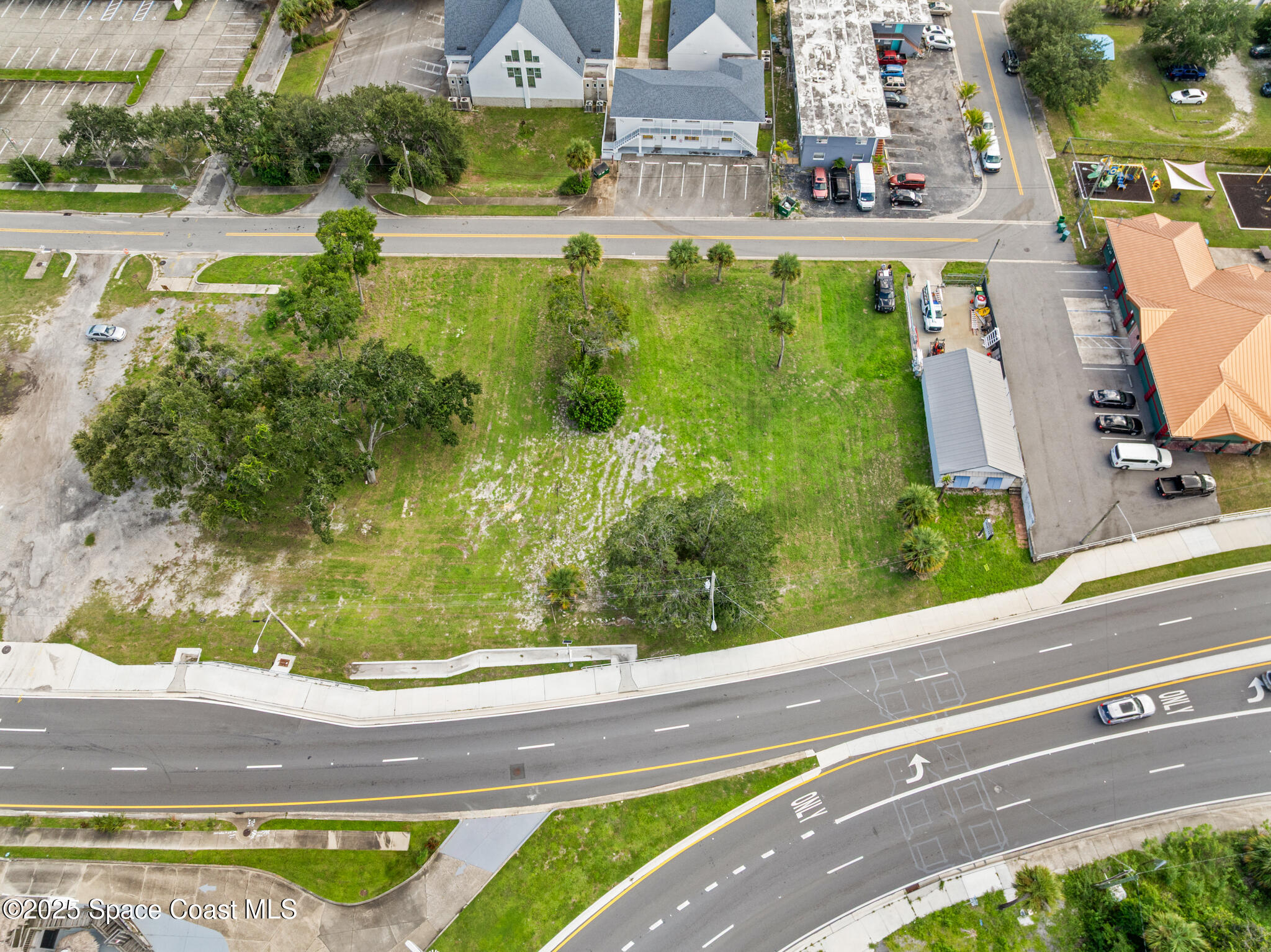 433 King Street Cocoa, FL 32922 - Photo 16 of 25 a view of swimming pool with a yard and large trees