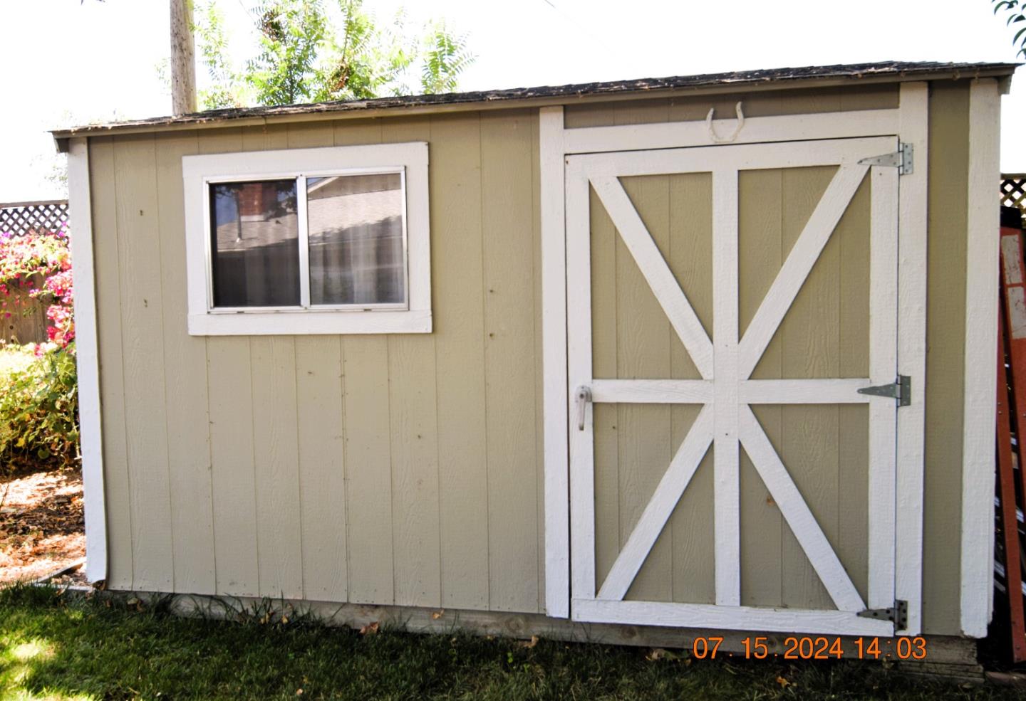 3909 Paladin Drive San Jose, CA 95124 - Photo 6 of 20 a wooden door with a small yard
