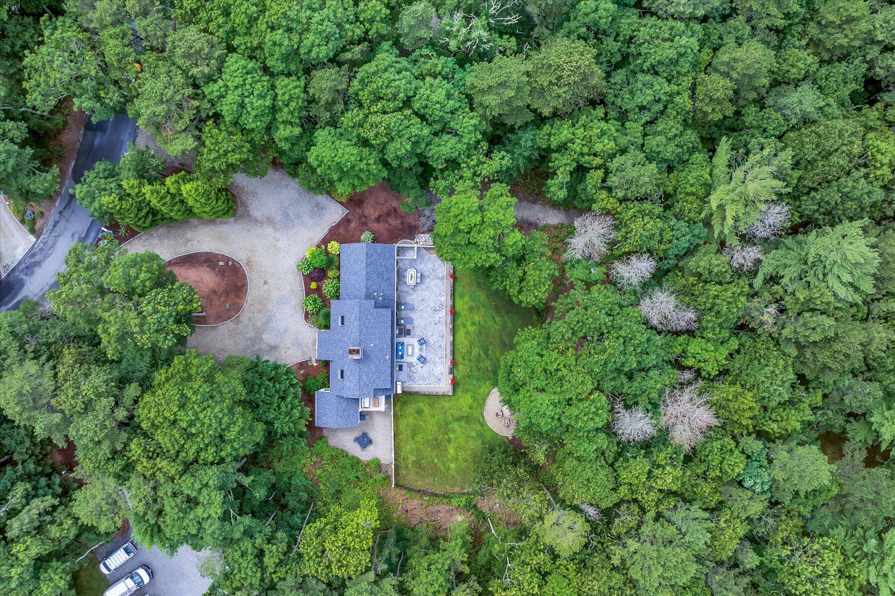 75 The Hunt Circle Mashpee, MA 02649 - Photo 44 of 49 an aerial view of residential house with outdoor space and trees all around
