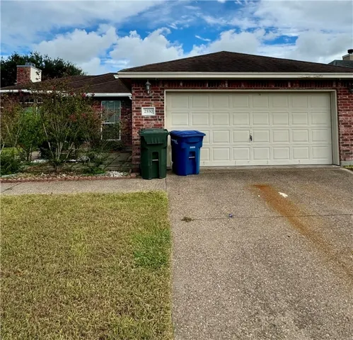 a view of outdoor space yard and garage