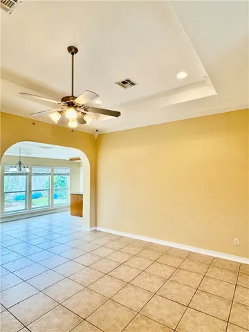 a view of a hallway with a chandelier