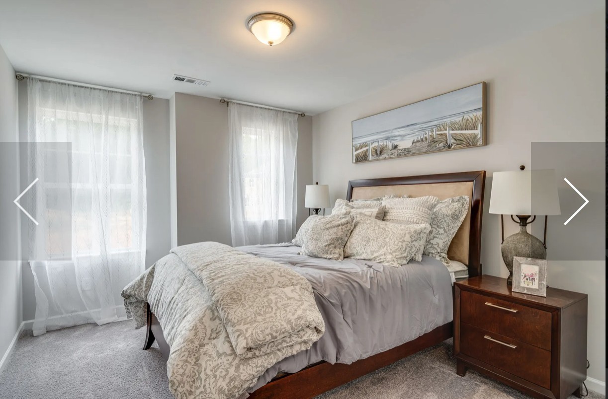 6161 Worthington Road Columbia, TN 38401 - Photo 28 of 33 a bedroom with a bed and wooden floor