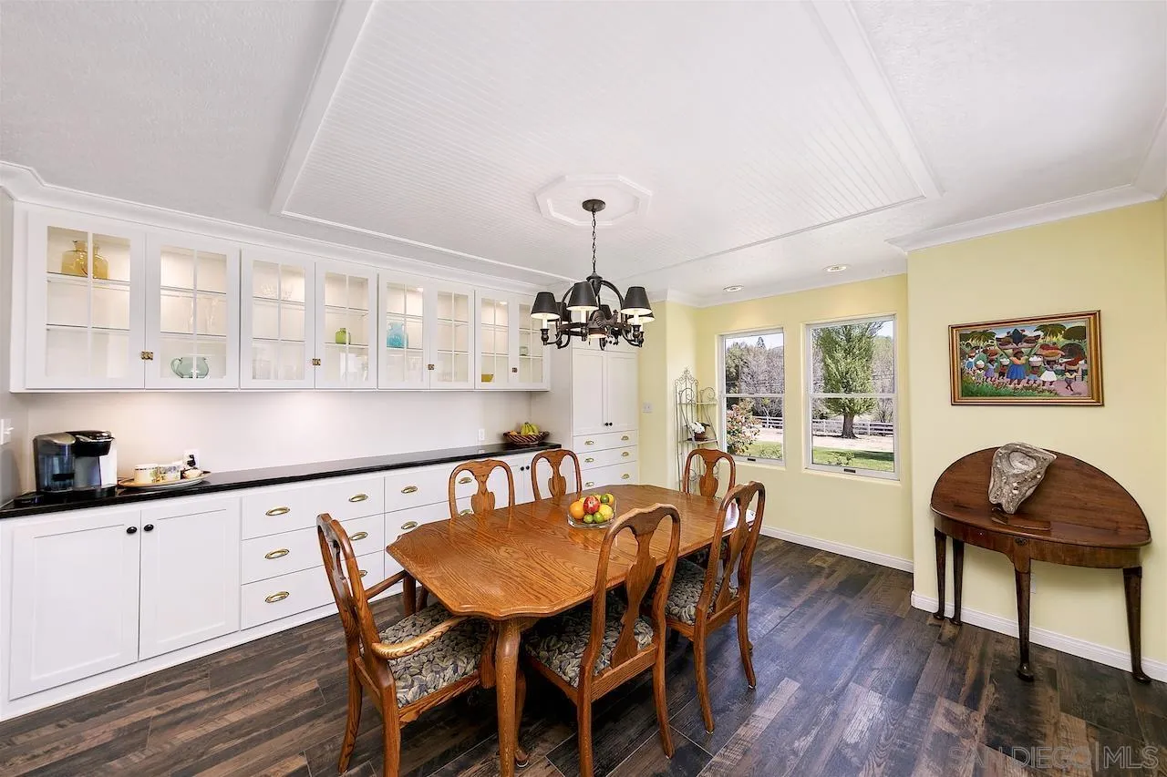 28659 Old Highway 80 Pine Valley, CA 91962 - Photo 11 of 55 a view of a dining room with furniture and wooden floor