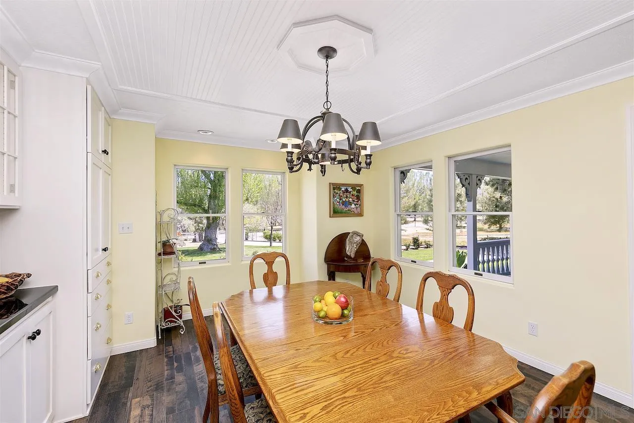 28659 Old Highway 80 Pine Valley, CA 91962 - Photo 12 of 55 a dining room with furniture a chandelier and wooden floor