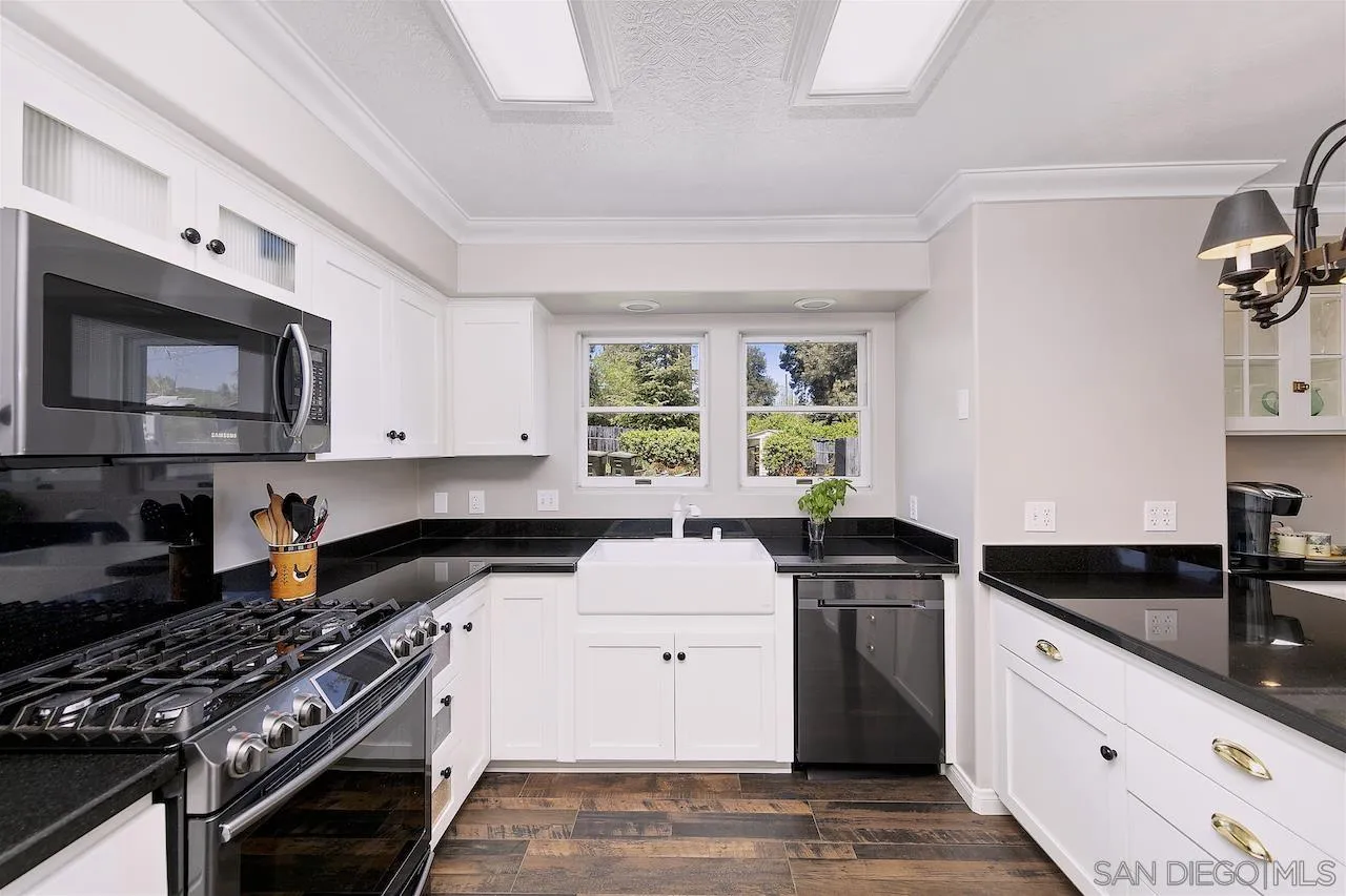 28659 Old Highway 80 Pine Valley, CA 91962 - Photo 15 of 55 a kitchen with granite countertop a stove sink and cabinets