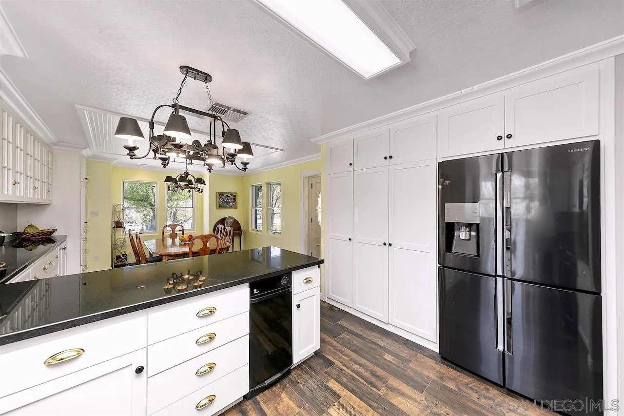 28659 Old Highway 80 Pine Valley, CA 91962 - Photo 16 of 55 a kitchen with a refrigerator and countertop