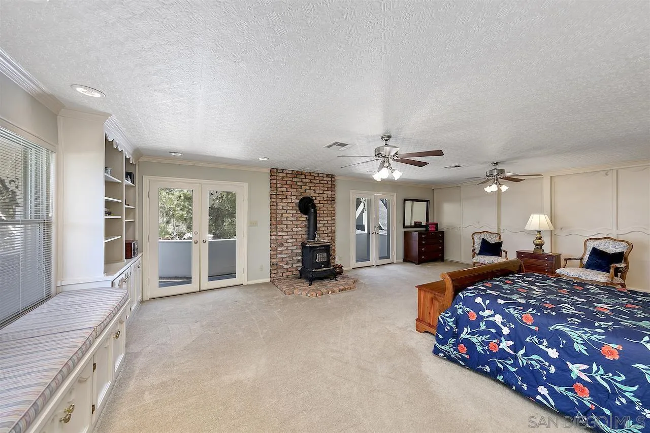 28659 Old Highway 80 Pine Valley, CA 91962 - Photo 21 of 55 a large bedroom with bed and a large window