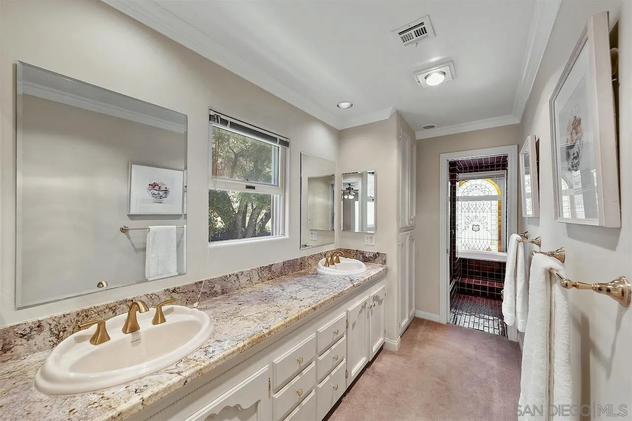 28659 Old Highway 80 Pine Valley, CA 91962 - Photo 26 of 55 a spacious bathroom with a sink and a mirror