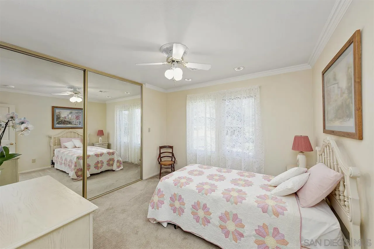 28659 Old Highway 80 Pine Valley, CA 91962 - Photo 30 of 55 a bedroom with a bed and a chandelier
