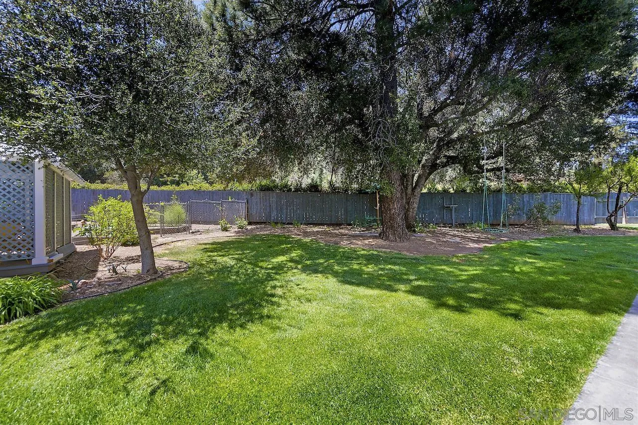 28659 Old Highway 80 Pine Valley, CA 91962 - Photo 37 of 55 a view of backyard with table and chairs and a large tree
