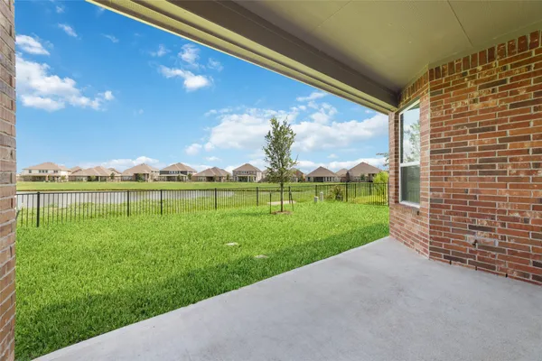a view of a field with a big yard