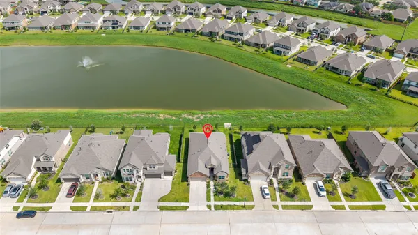 view of outdoor space with seating area and trees in the background