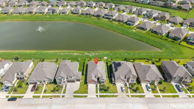 view of outdoor space with seating area and trees in the background