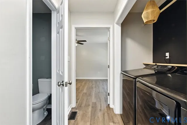 a view of a kitchen from the hallway