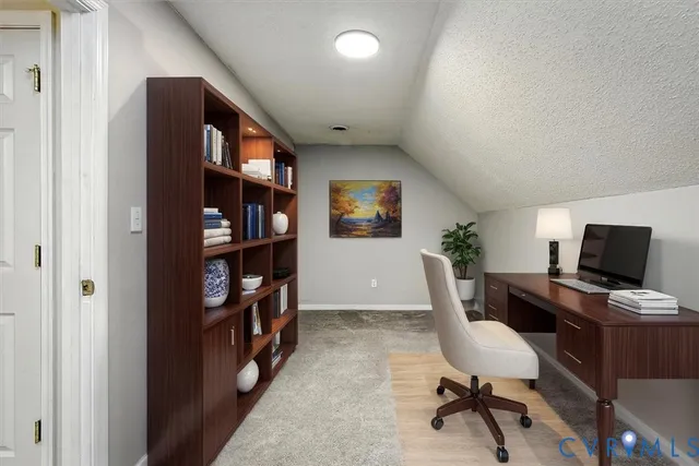 a workspace with furniture and bookshelf