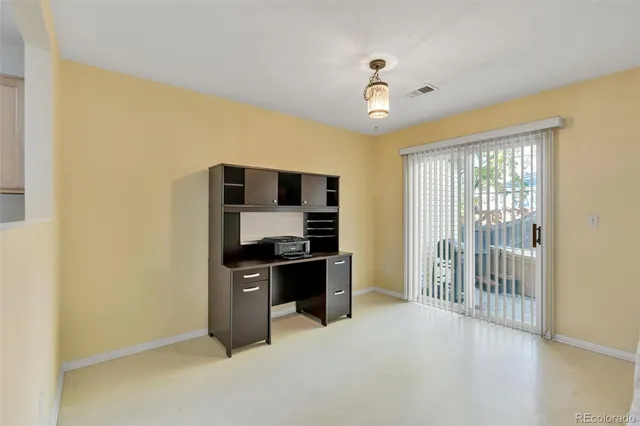 a kitchen with stainless steel appliances granite countertop a stove and a refrigerator