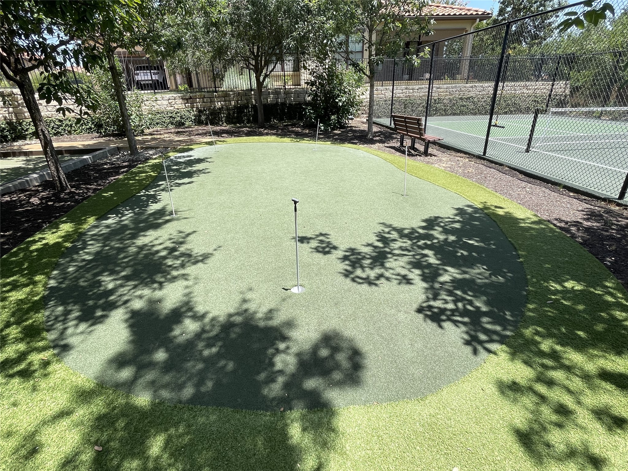 104-2 Rivalto Circle, Unit 1 Lakeway, TX 78734 - Photo 24 of 27 Tuscan Village Community Putting Green