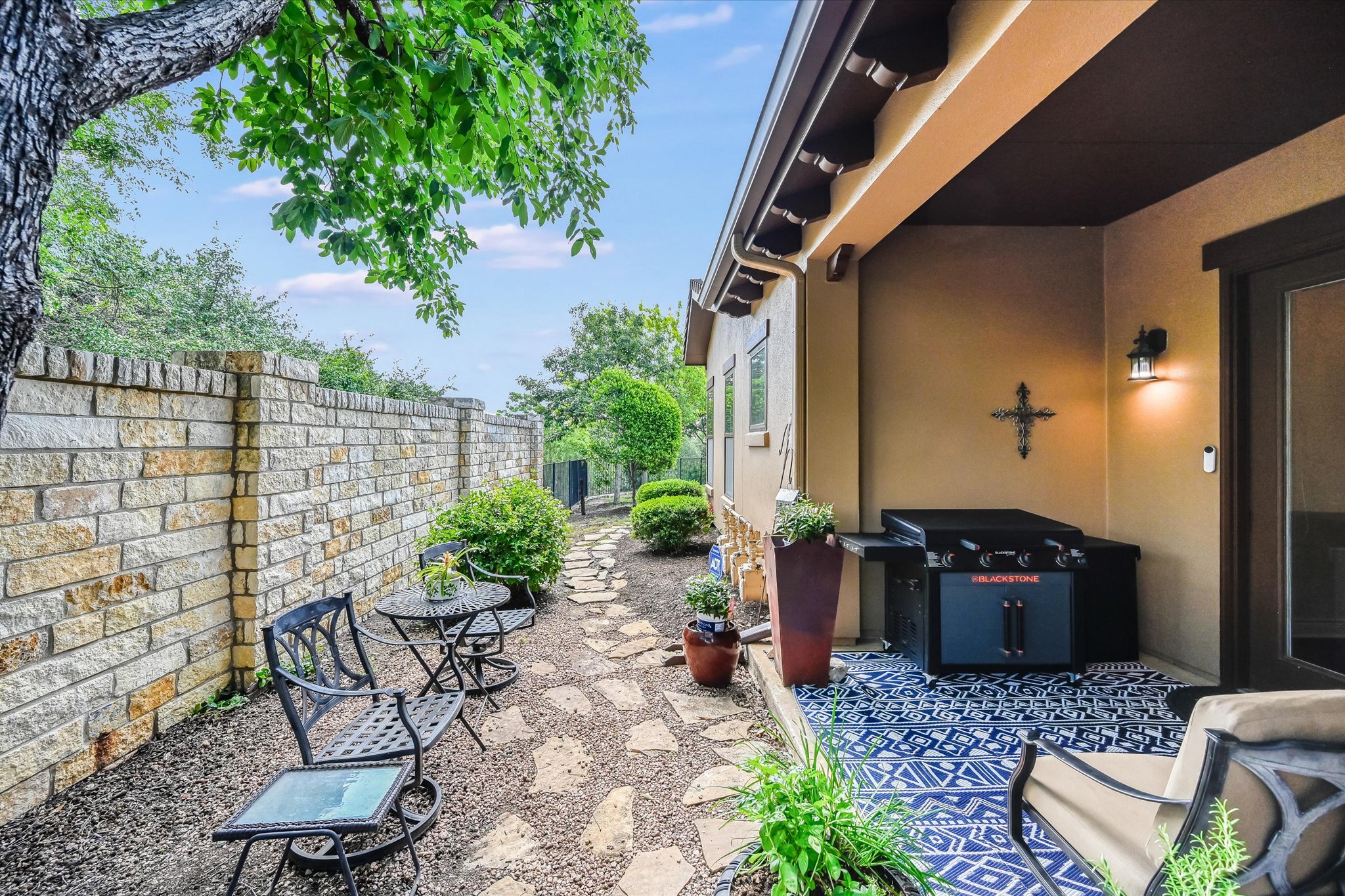 104-2 Rivalto Circle, Unit 1 Lakeway, TX 78734 - Photo 3 of 27 This end unit has a private patio and garden area