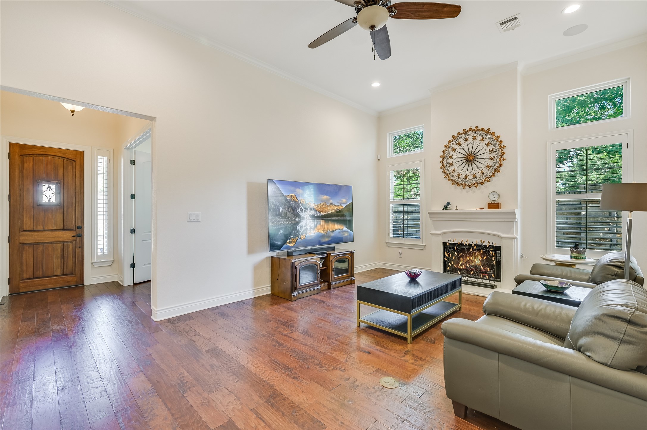 104-2 Rivalto Circle, Unit 1 Lakeway, TX 78734 - Photo 6 of 27 Living room off the entry way and a separate office up front