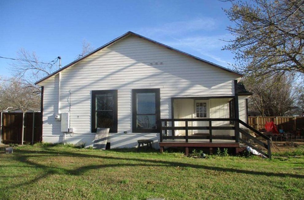 115 West Spruce Street Whitewright, TX 75491 - Photo 6 of 7 a front view of a house with a yard