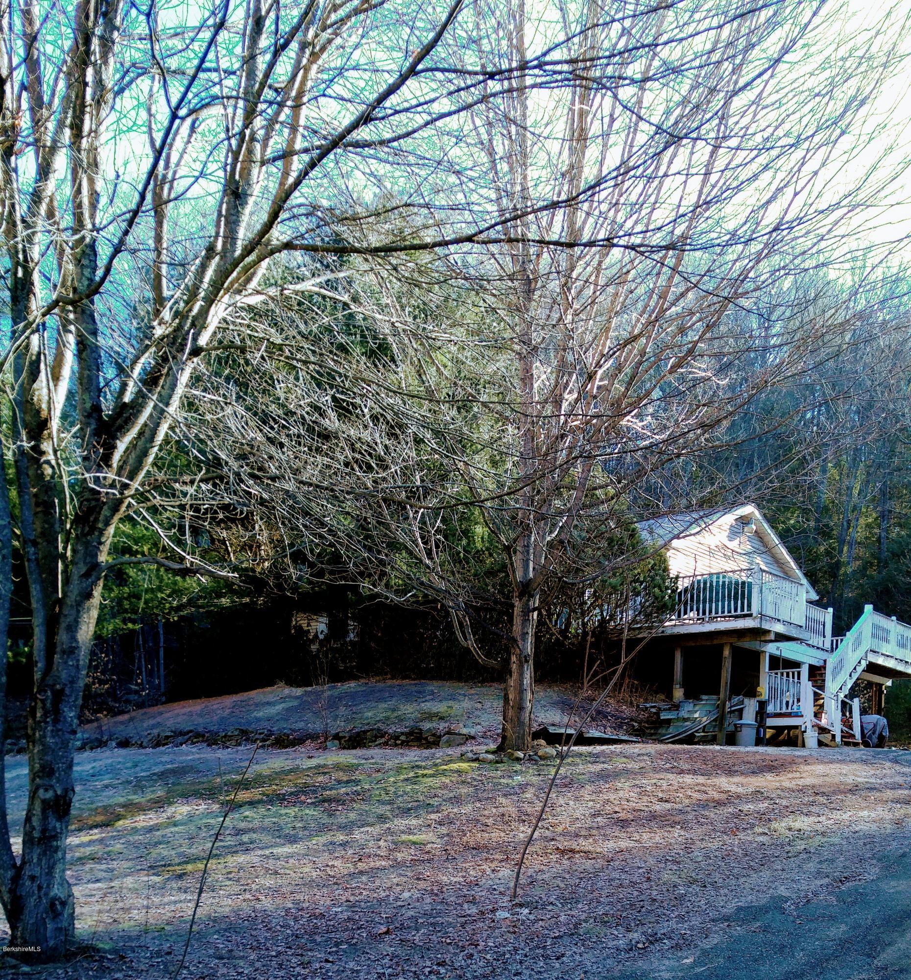 171 Worthington Road Huntington, MA 01050 - Photo 1 of 2 a front view of a house with garden